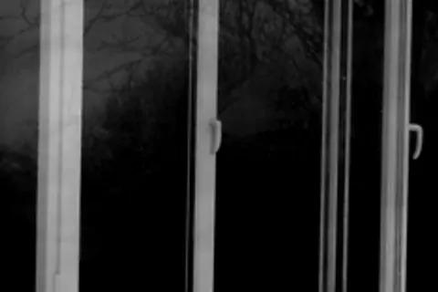 Double-glazed window and frame